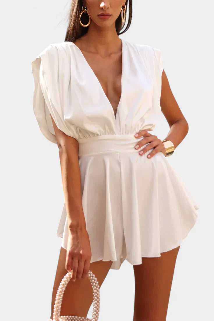 Rosaura · Mono corto con escote profundo y cintura definida